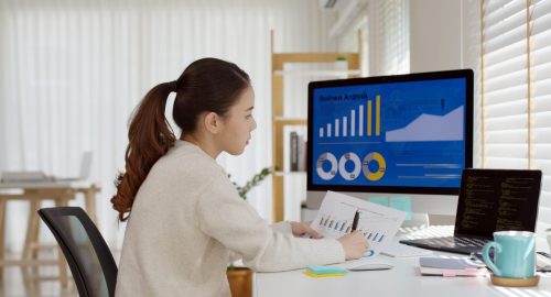 young-attractive-asian-thai-woman-employee-busy-work-online-multiple-screen-laptop-computer-e1669533630205